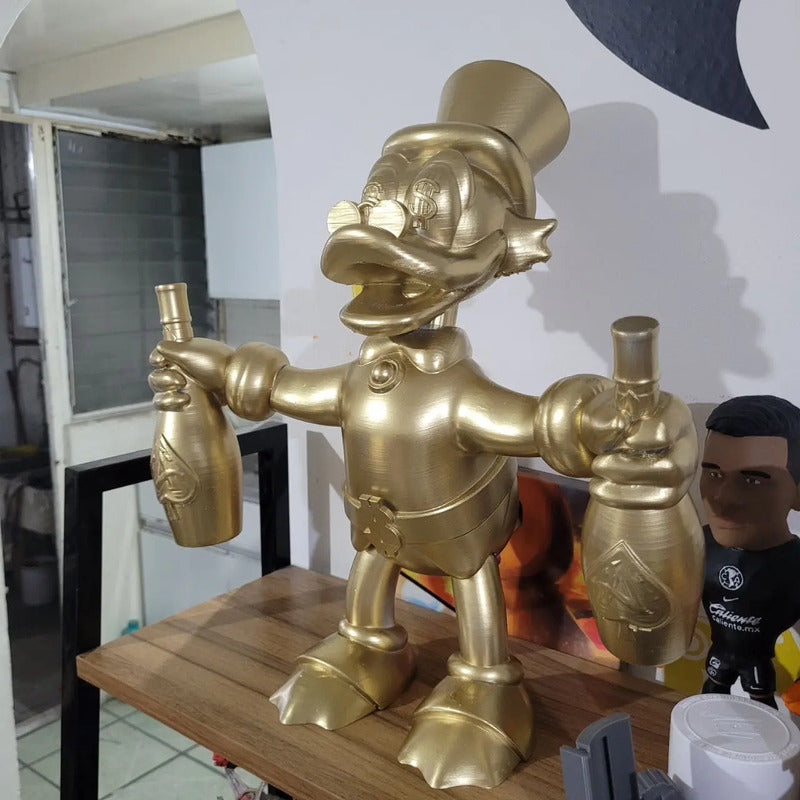 Figura De Rico Mcpato Dorado 30 Cm
